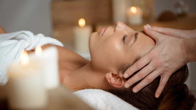 young-woman-having-face-massage-relaxing-in-spa-salon-bd.jpg